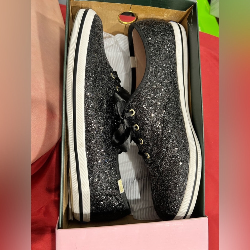 Women’s Kate spade black glitter keds.